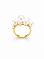 Gold multi pearl statement ring on white background